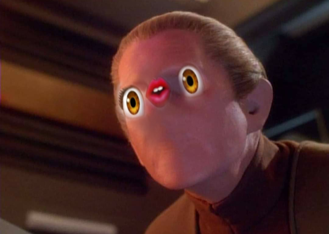 This meme features a photo of a character from the Star Trek: Deep Space Nine TV series, known as Odo, with a grotesque and exaggerated facial expression. The image is captioned "I'm not a crook, I'm a...". The meme is likely referencing the infamous "I'm not a crook" speech by Richard Nixon, implying that Odo is similarly trying to downplay his involvement in a questionable activity.